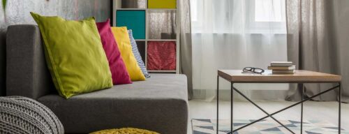 Grey sofa and small table in modern living room